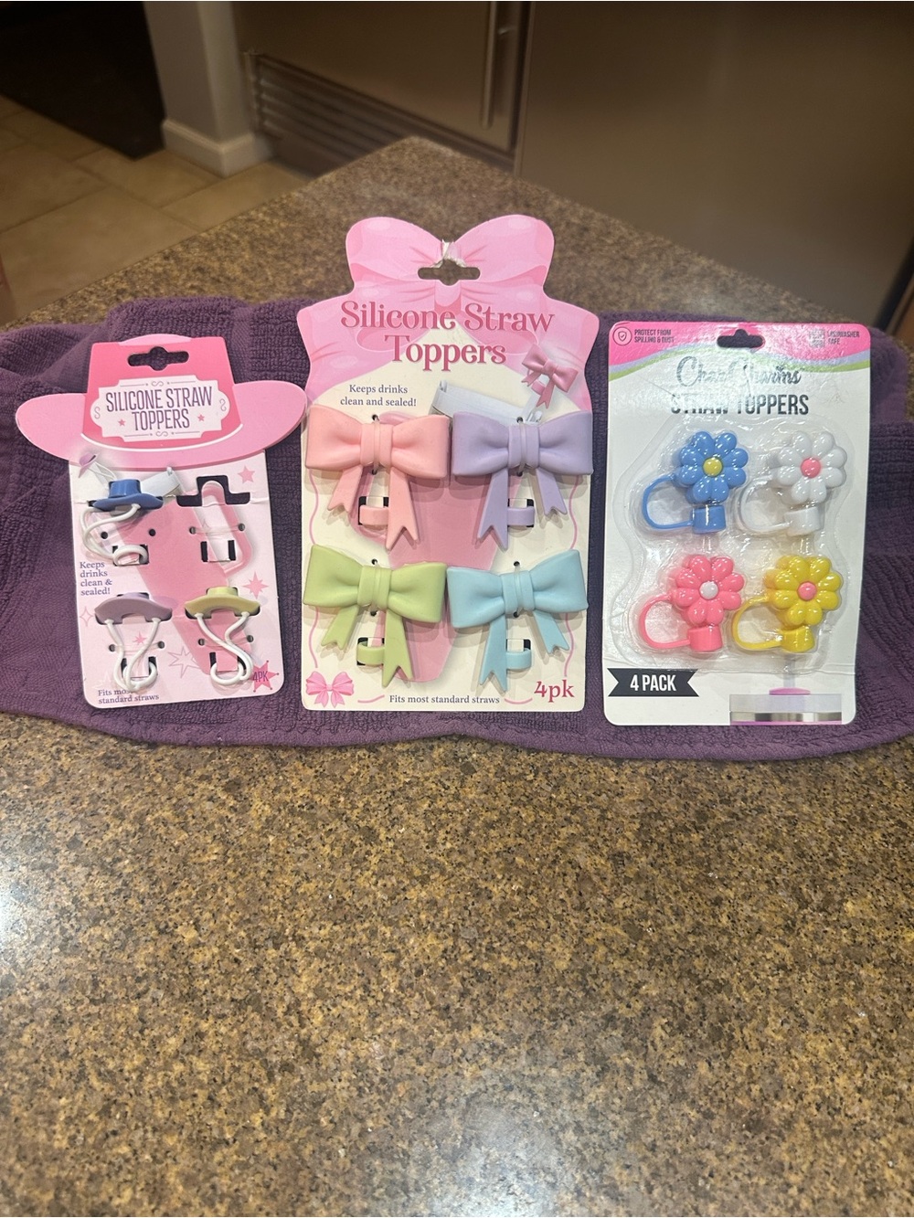 Silicone Bow, Flower Straw Toppers, and Cowboy hats. 11 total. All brand new